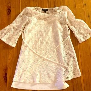 White lace top. Worn once or twice, in brand new condition.